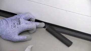 How to fit PVC cove former for vinyl flooring & wall?